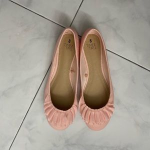 Pink flats.